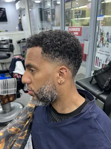 Clean taper haircut with sharp line detail