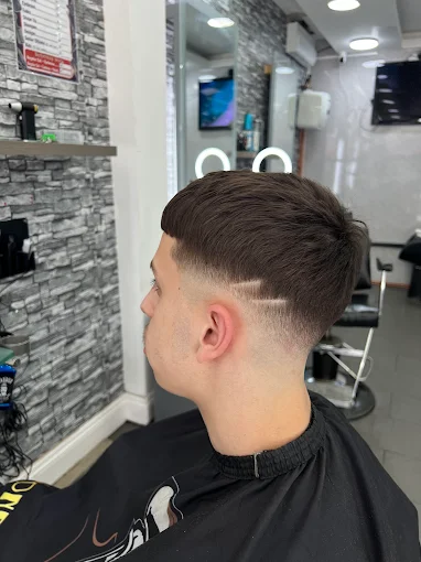 Curly fade and beard trim at Maru Barber Shop